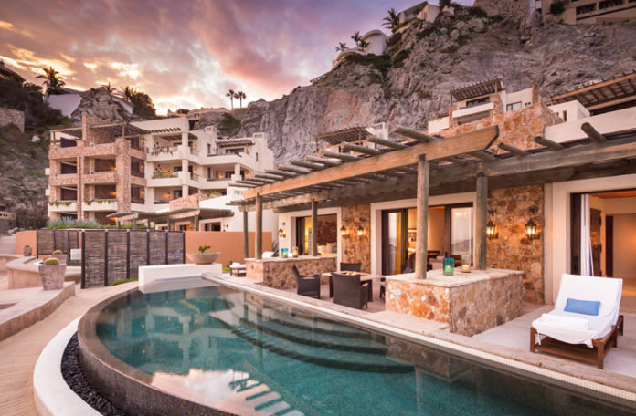 a pool in front of a building