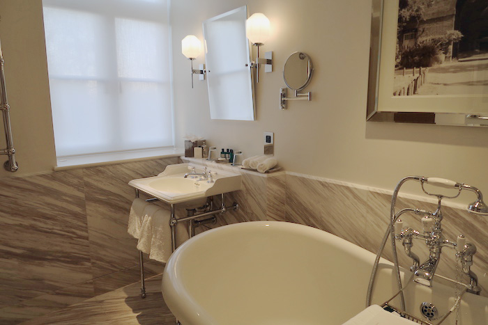 a bathroom with a sink and mirror