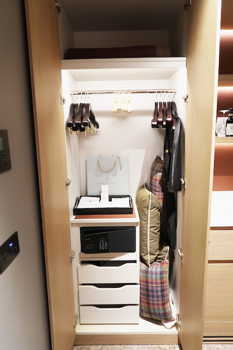 a closet with a bag and swingers