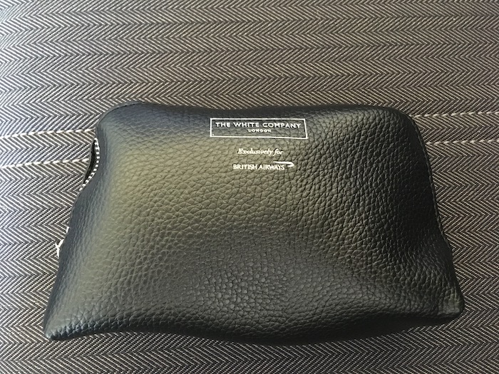 a black leather pouch on a black surface