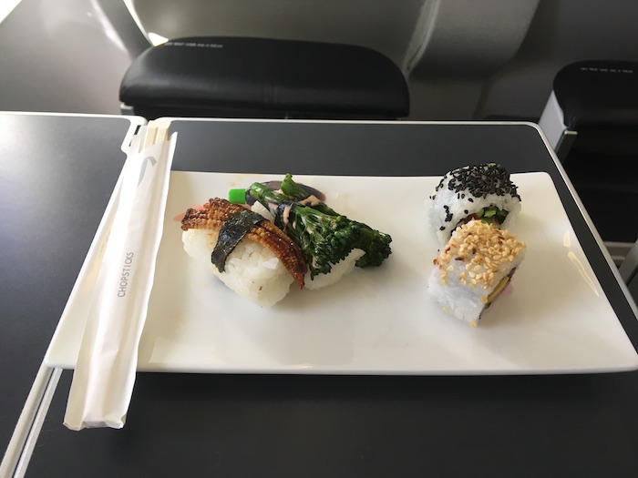 a plate of sushi on a table