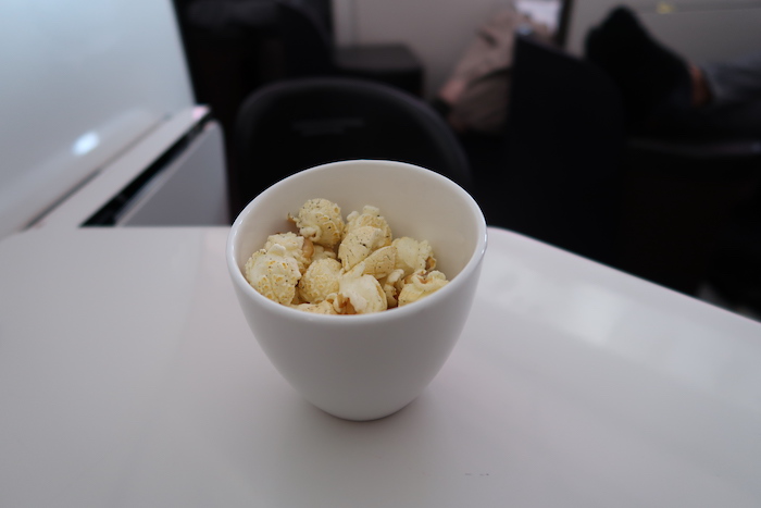 a bowl of popcorn on a table