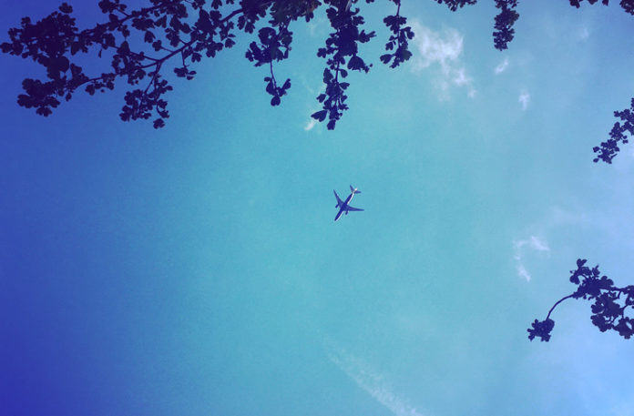 an airplane flying in the sky
