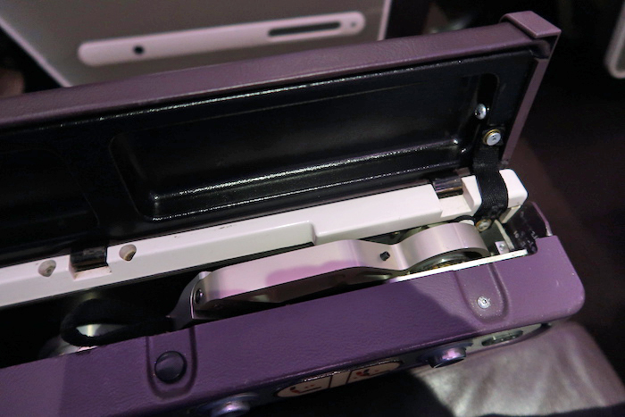 a purple case with a white object in it