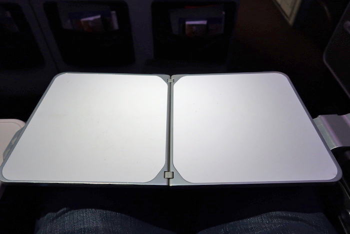 a white rectangular object with a black cover