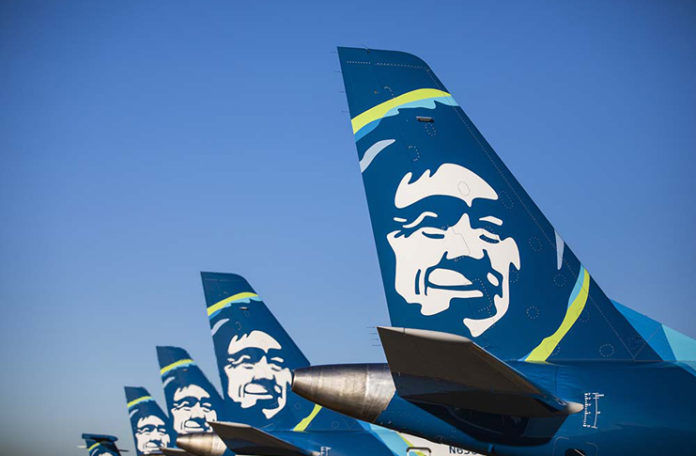 a group of airplanes with faces on the tail