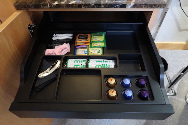 a drawer with a variety of items in it
