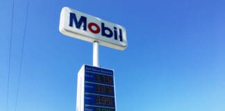 a sign with prices on it