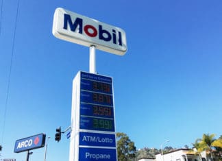 a sign with prices on it