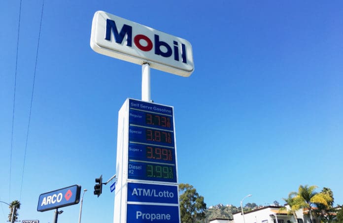 a sign with prices on it