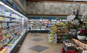 a grocery store with shelves of food and drinks