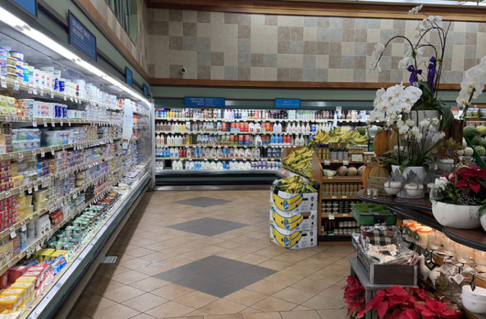 a grocery store with shelves of food and drinks