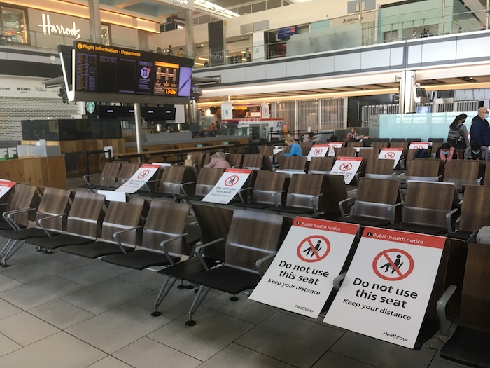 a group of chairs in a terminal