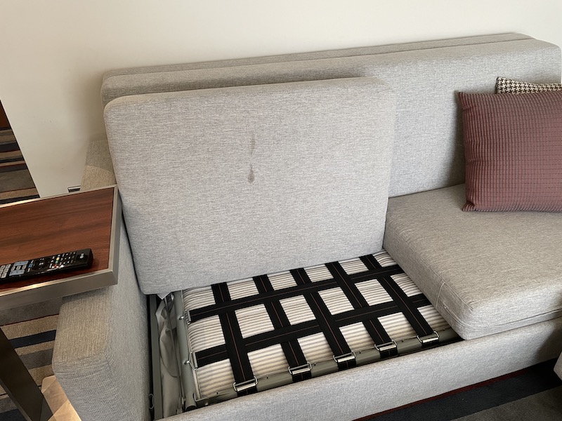 a couch with a seat open