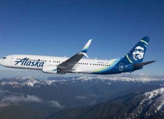 a plane flying over mountains
