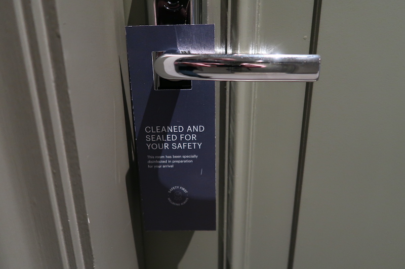 a sign on a door handle