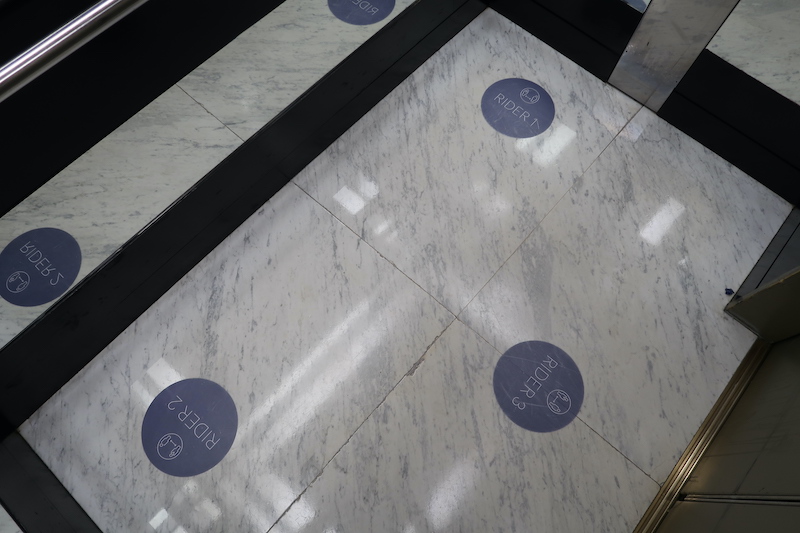 a marble floor with blue circles on it