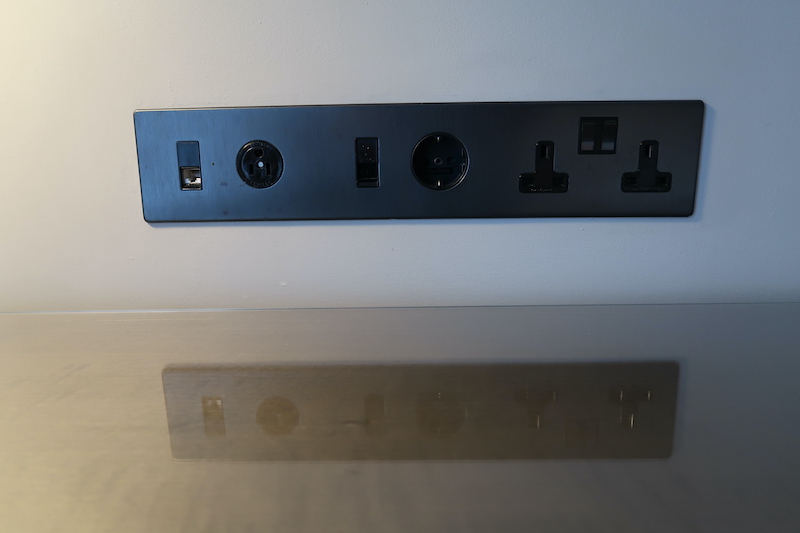 a black rectangular outlet with multiple outlets