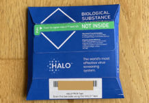 a blue package on a wood surface