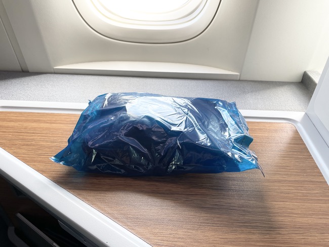 a blue plastic bag on a table