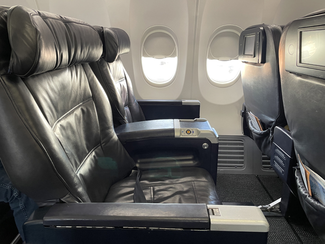 a black leather seats in an airplane