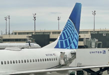 a plane with blue tail fin