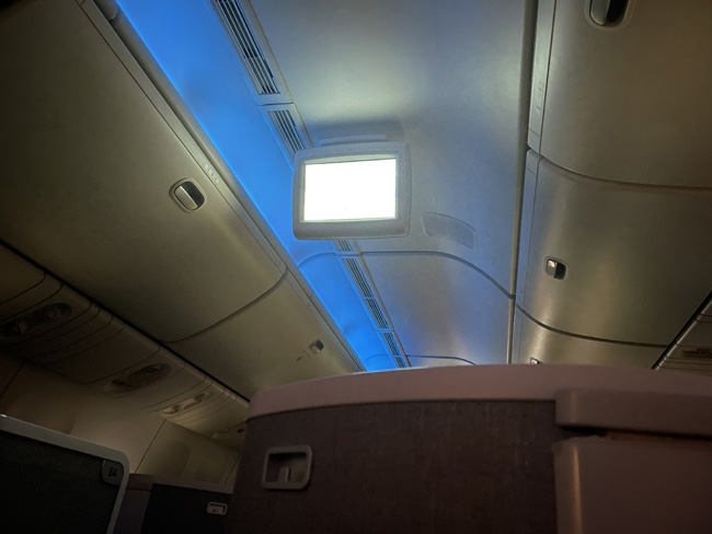 a tv screen on a plane