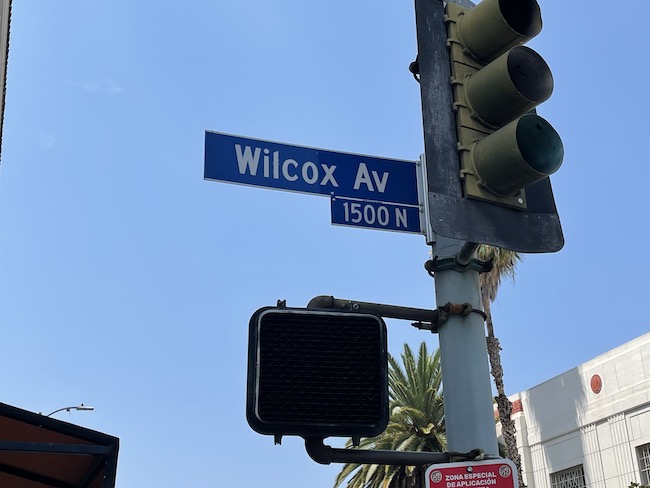 a street sign and traffic light