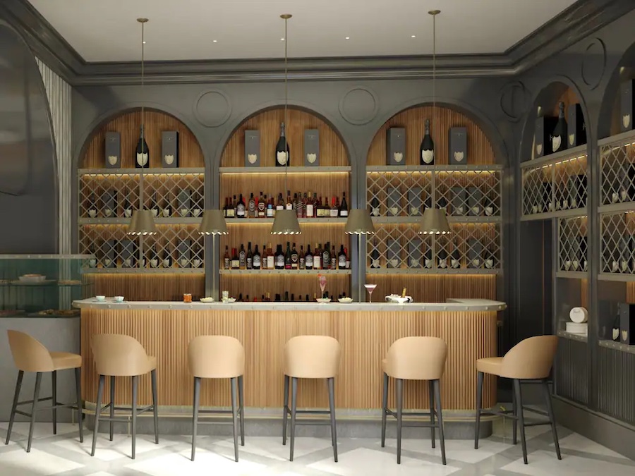 a bar with chairs and a shelf with bottles