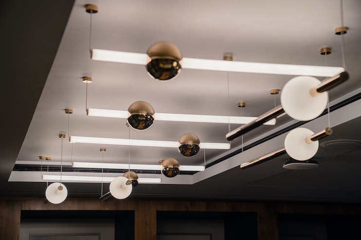 a ceiling with lights and balls