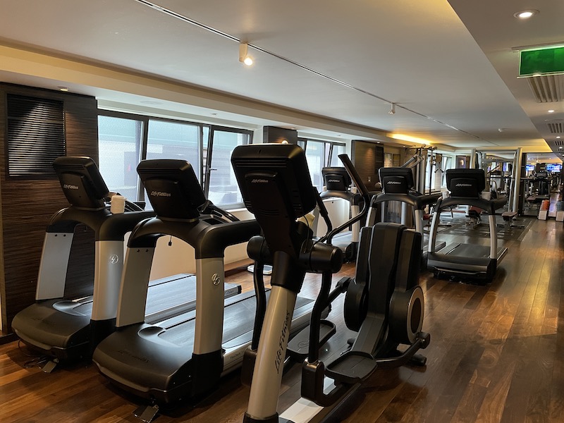 a room with treadmills and exercise machines