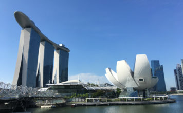 a water next to buildings