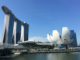 a water next to buildings