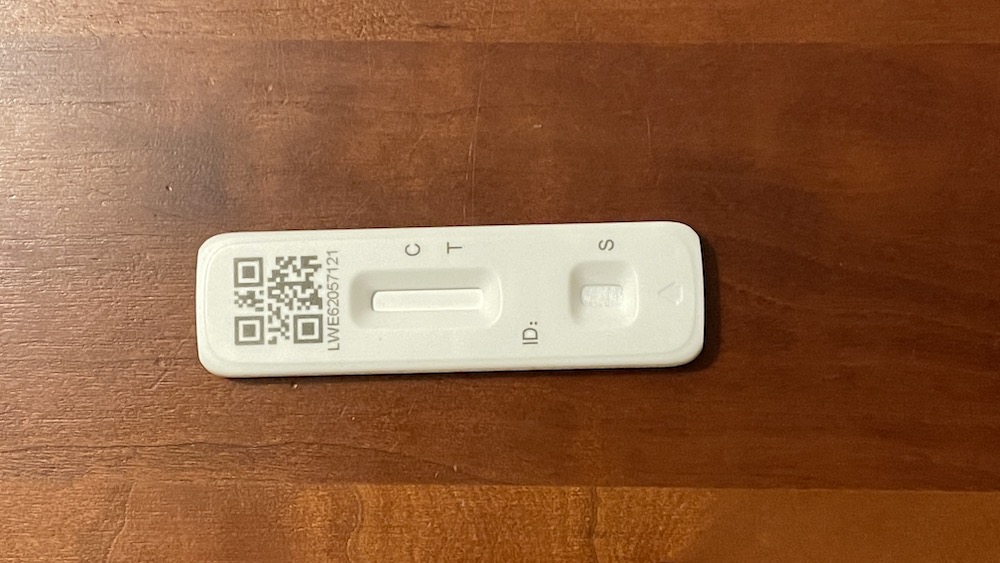 a white plastic object with a qr code on it