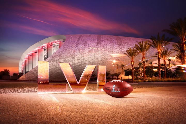 a football and a building with palm trees