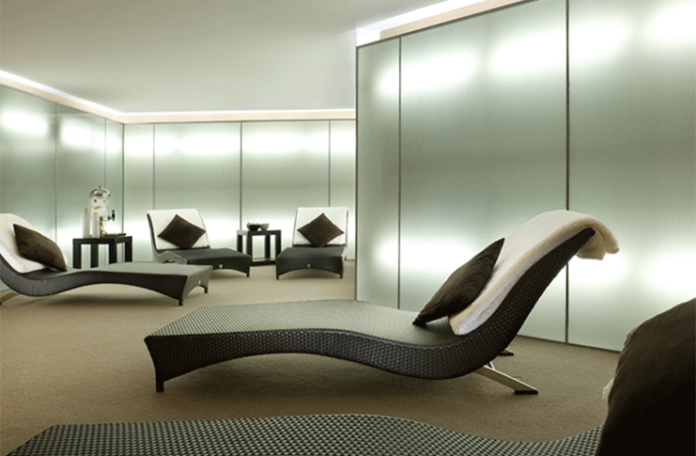 a lounge chair in a room
