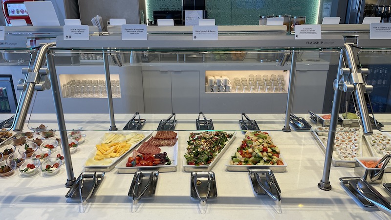 a buffet with different food on the counter