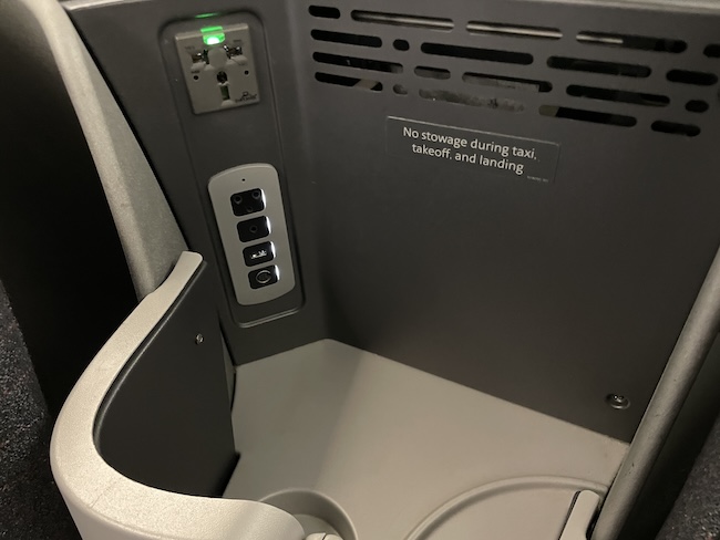 American Airlines A321T Business Class seat power and USB ports.