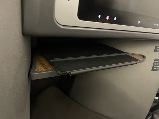a tablet on a shelf