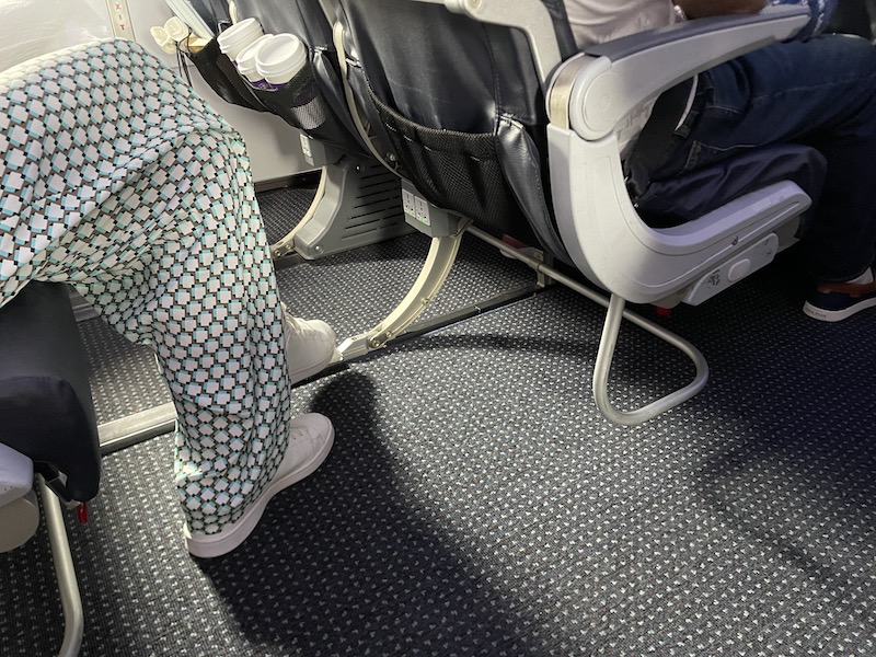 a person in pajamas on a plane
