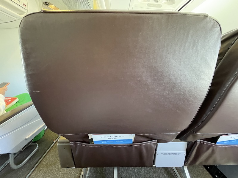 a seat with a pocket in the back