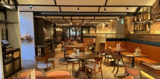 a room with tables and chairs