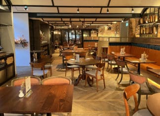 a room with tables and chairs