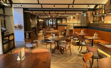 Will Amex’s purchase of TheFork boost a Platinum Card benefit? a room with tables and chairs