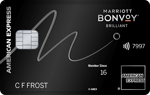a black credit card with a white line and a chip