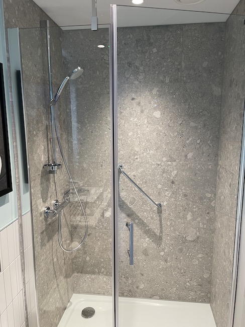 a shower with a glass door