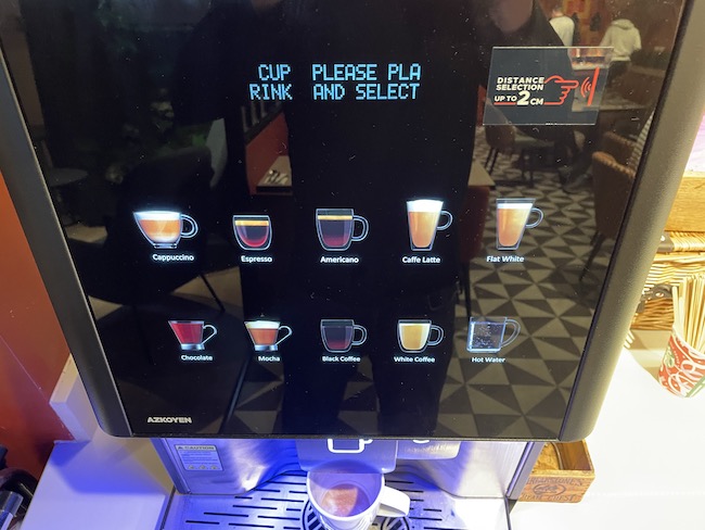 a coffee machine with a screen