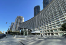 a large building with many tall buildings