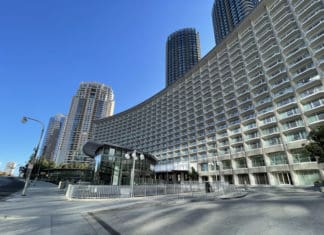 a large building with many tall buildings