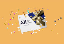 a gift card with a bow and confetti